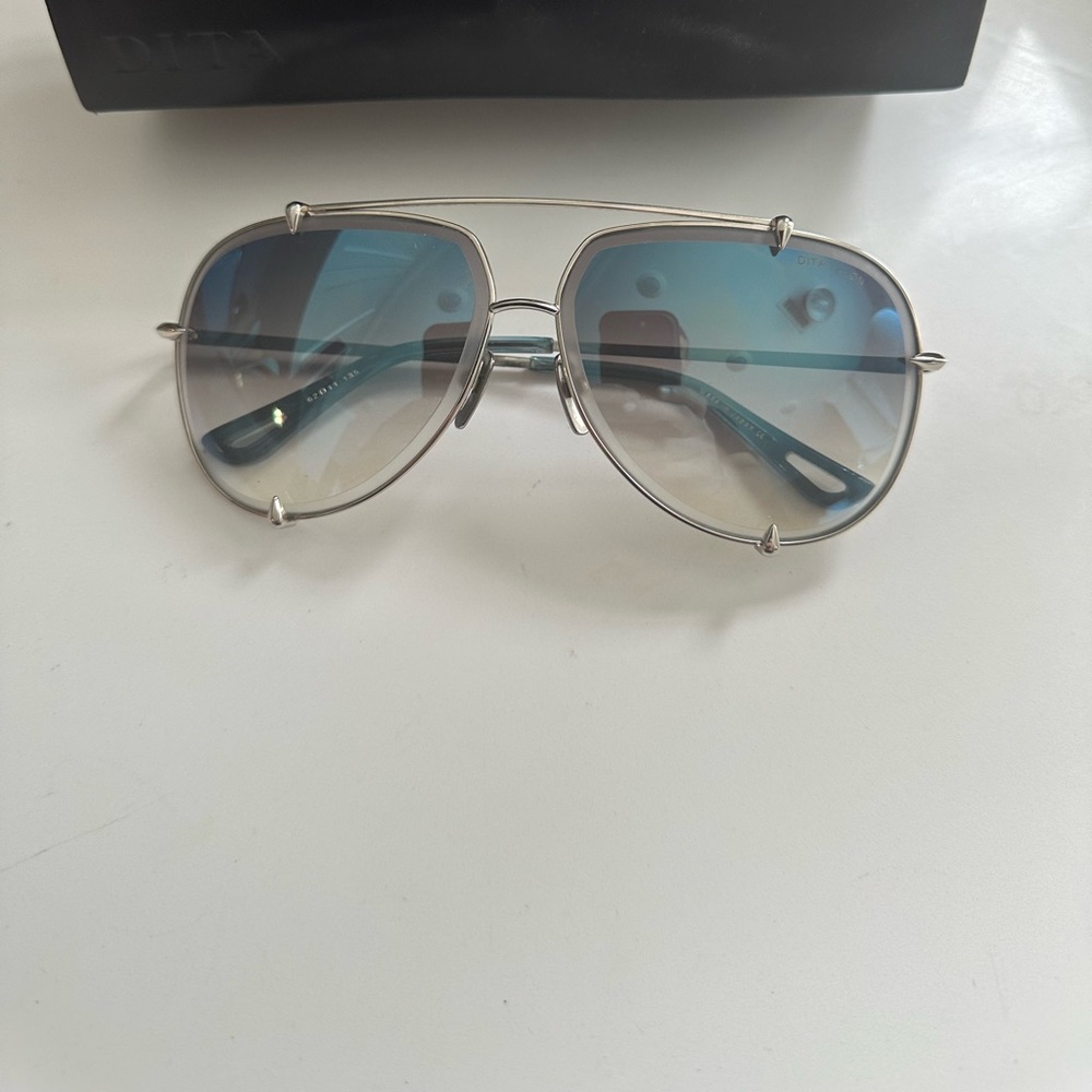 Dita Talon Blue lenses silver plated titanium. Perfect condition not a scratch